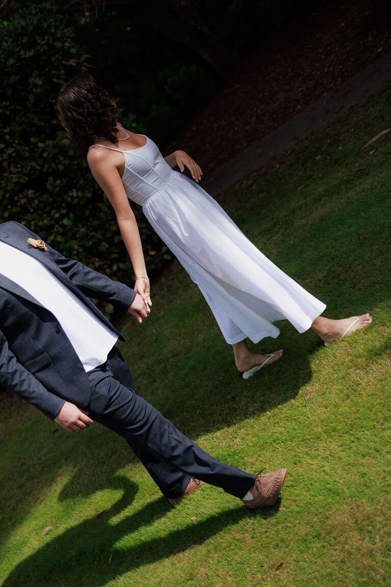 Couple lying in the grass, photographed from above